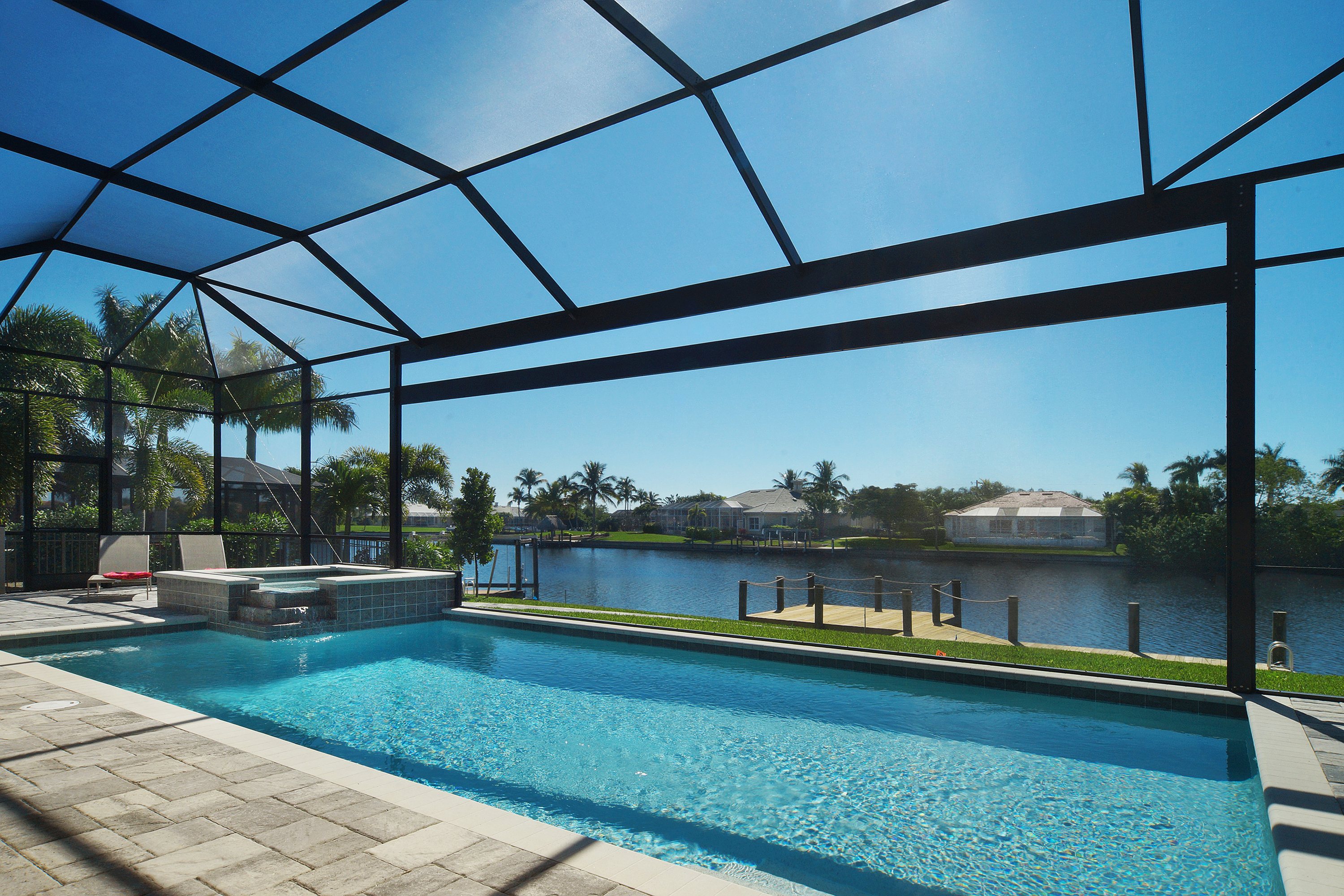 Villa Capricorn – Heated Saltwater Pool, Hot Tub & Private Boat Dock on the Canal