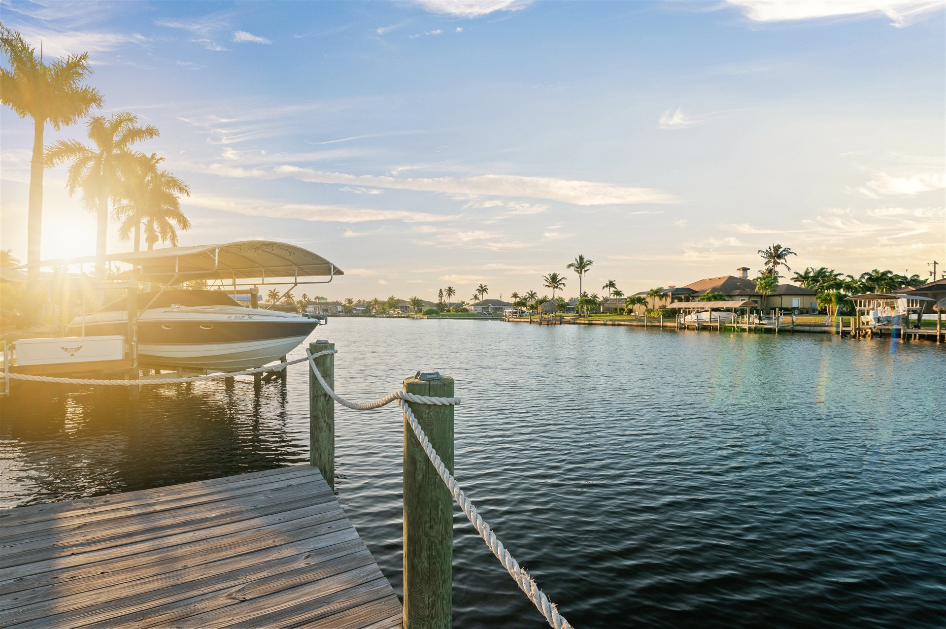 Boat dock on the canal at sunset